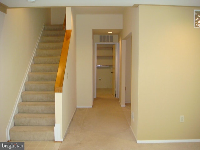 stairway with carpet flooring