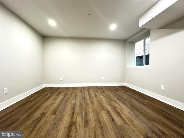 empty room with wood-type flooring