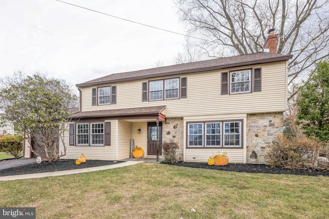 view of front of house featuring a front yard