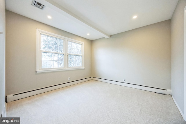 carpeted spare room featuring beam ceiling