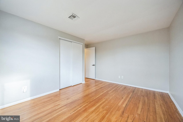 empty room with light wood-type flooring