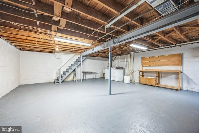 basement featuring separate washer and dryer