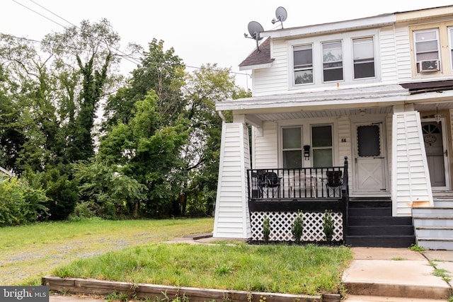 view of front of home featuring covered porch