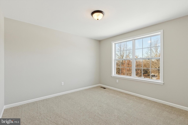 view of carpeted spare room