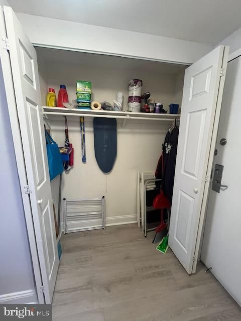 mudroom with light wood finished floors