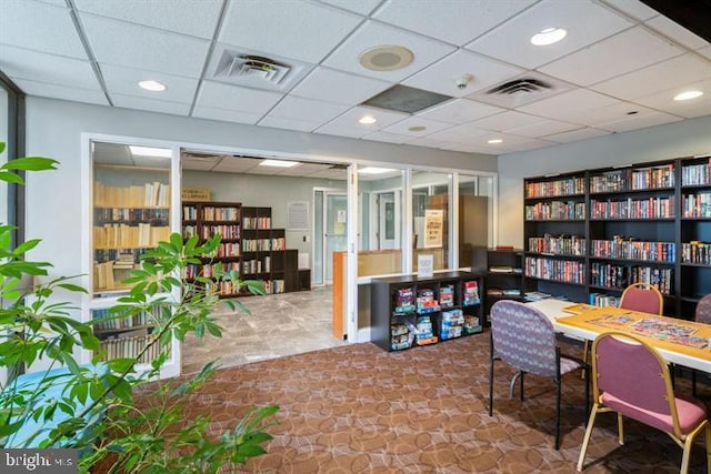 home office featuring a drop ceiling