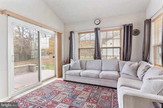 living room with lofted ceiling