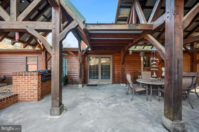 view of patio with an outdoor kitchen and area for grilling