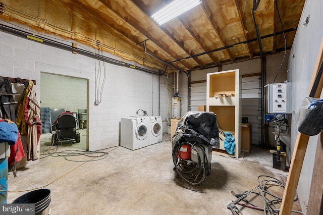 basement with washing machine and dryer and gas water heater