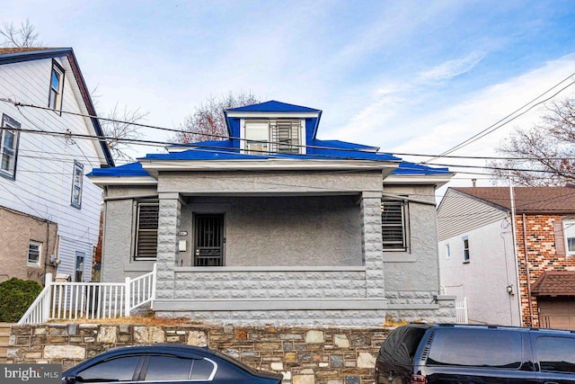 view of front of house featuring covered porch