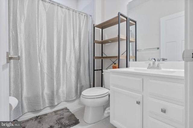 full bathroom featuring tile patterned flooring, vanity, toilet, and shower / bathtub combination with curtain