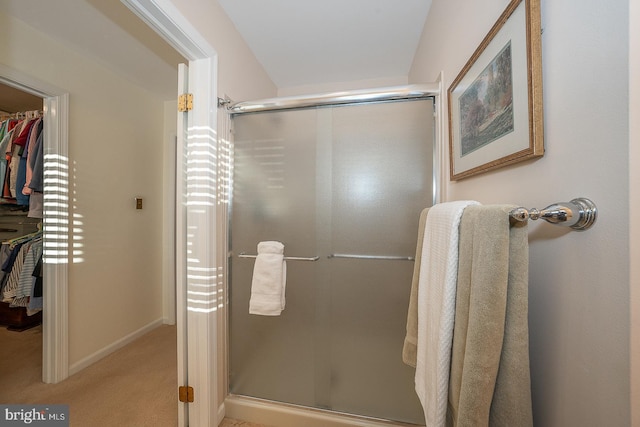 bathroom featuring walk in shower