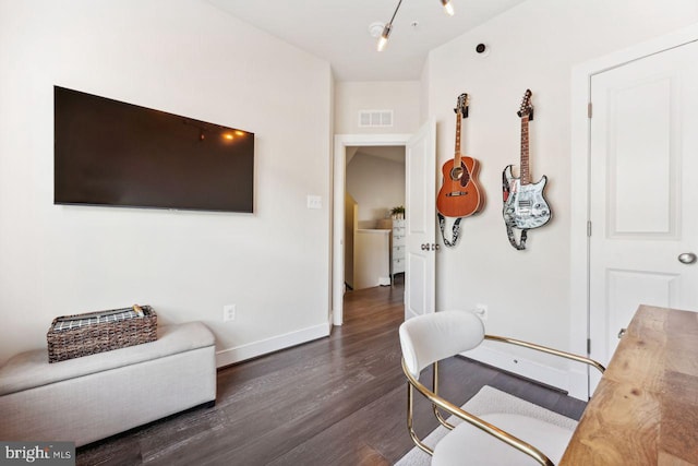 living area with dark wood-type flooring