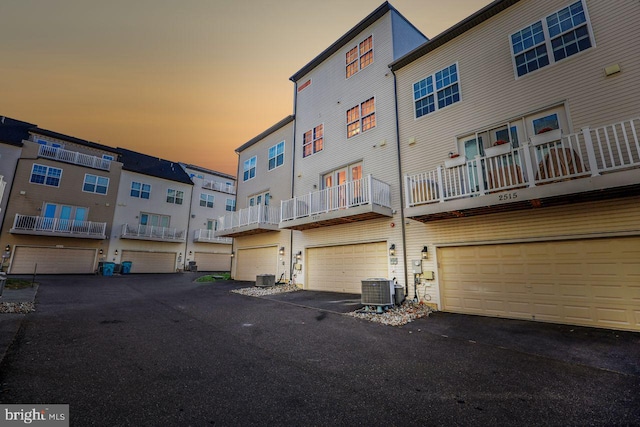 outdoor building at dusk with central AC unit