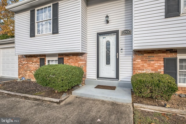 entrance to property with a garage