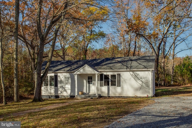 ranch-style house with a front yard