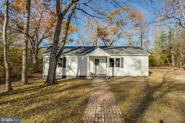 ranch-style house with a front yard