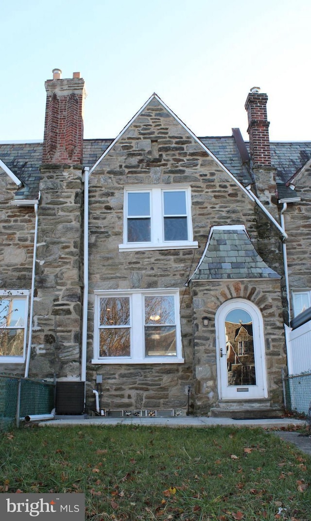 view of front of house with cooling unit