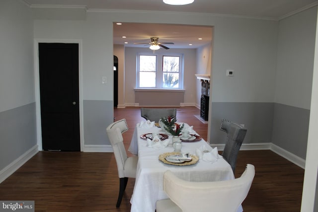 dining space featuring ornamental molding, dark hardwood / wood-style floors, and ceiling fan