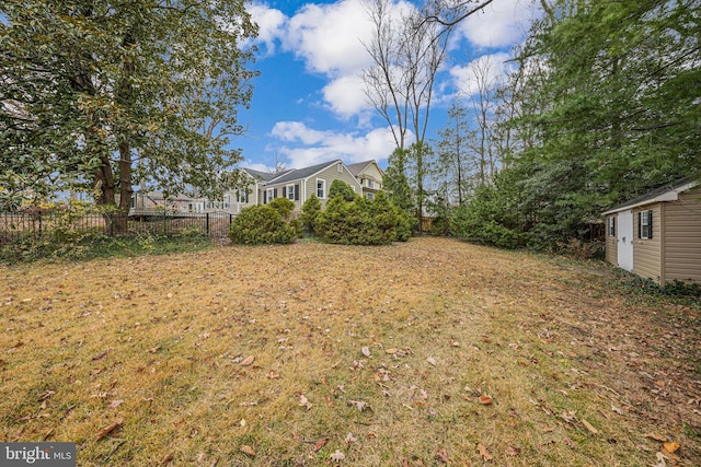 view of yard featuring fence