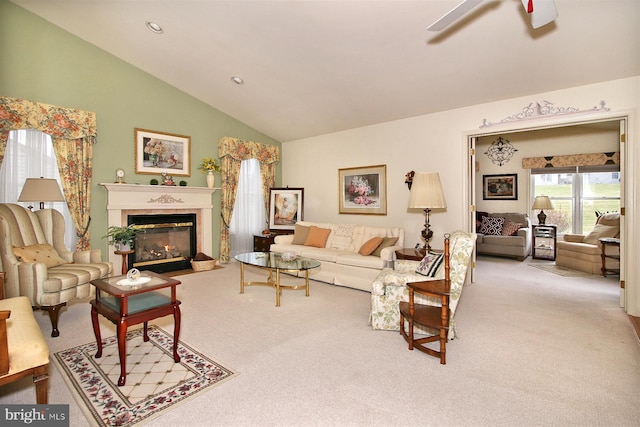 living room with light carpet and vaulted ceiling