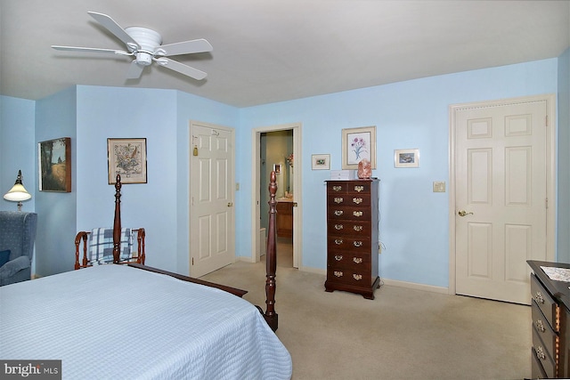 bedroom featuring ceiling fan and light colored carpet