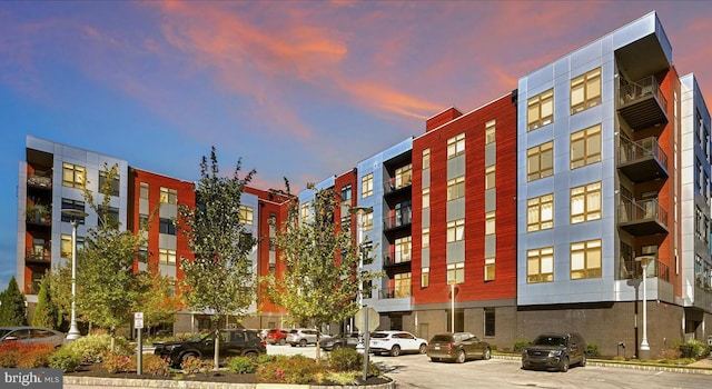 view of outdoor building at dusk