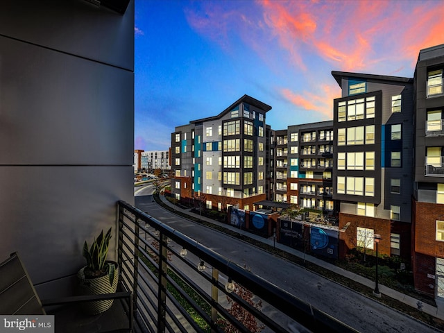 view of balcony at dusk