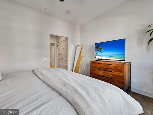 bedroom with hardwood / wood-style flooring