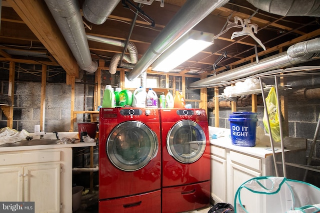 laundry area featuring washing machine and dryer