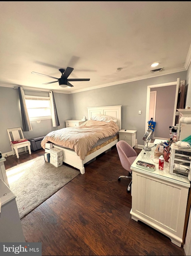 bedroom featuring ceiling fan, dark hardwood / wood-style floors, and crown molding