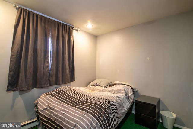 bedroom with a baseboard radiator