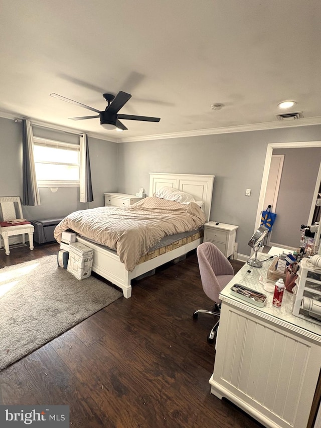 bedroom featuring crown molding, ceiling fan, and dark wood-type flooring