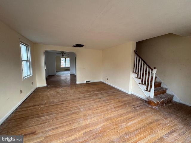 unfurnished living room featuring light hardwood / wood-style flooring