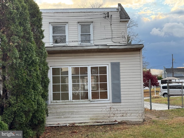 view of property exterior at dusk