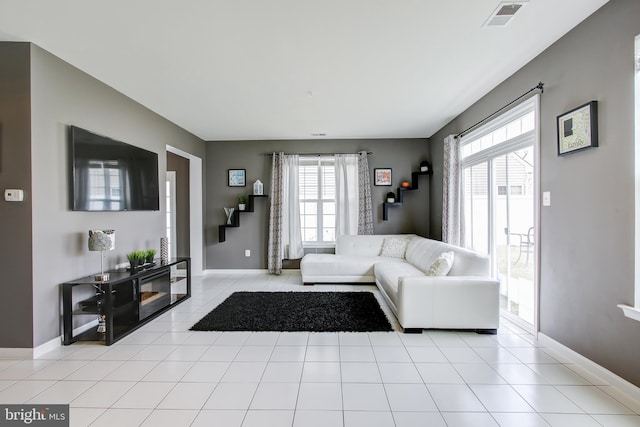 living room with plenty of natural light