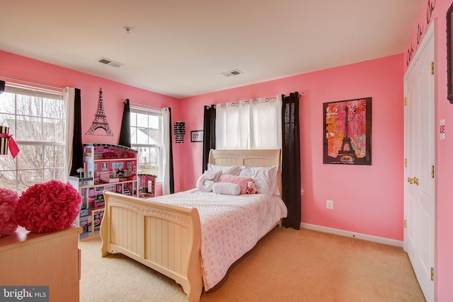 bedroom with light carpet