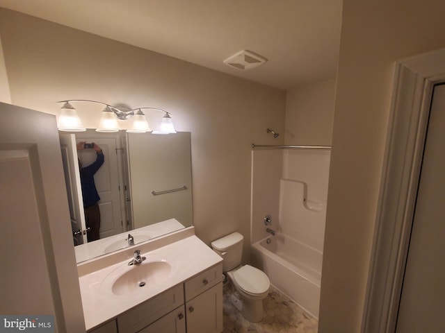 full bathroom featuring vanity, toilet, and tub / shower combination