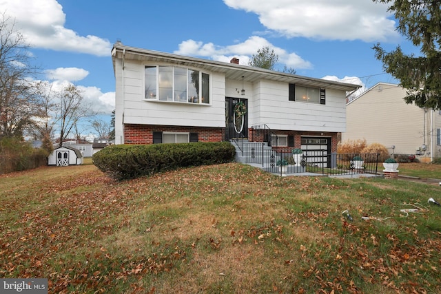 bi-level home featuring a shed and a front lawn