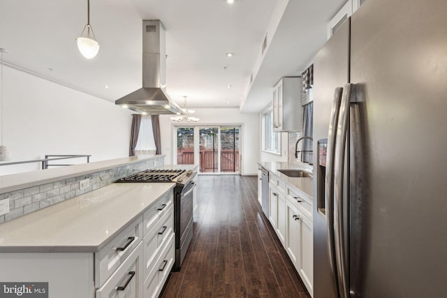 kitchen with white cabinets, stainless steel appliances, dark hardwood / wood-style floors, and island range hood