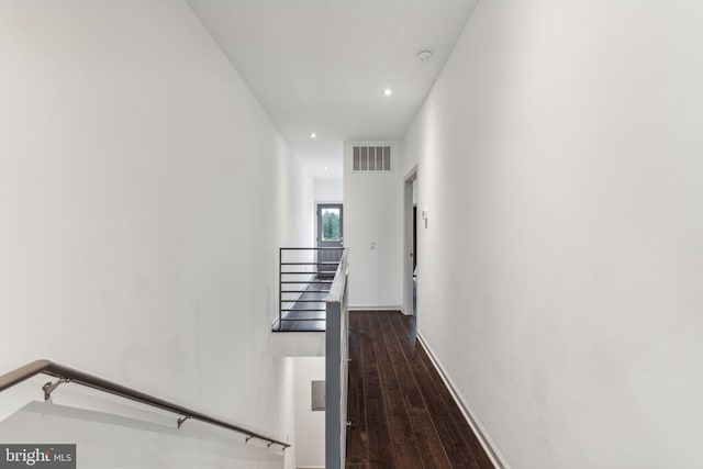 hall featuring dark wood-type flooring