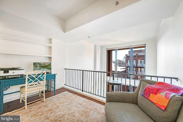 sitting room with hardwood / wood-style floors