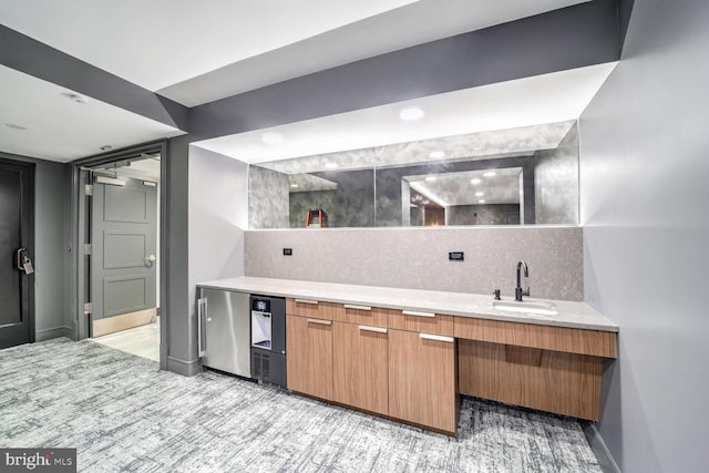 bathroom with tasteful backsplash, vanity, and hardwood / wood-style flooring