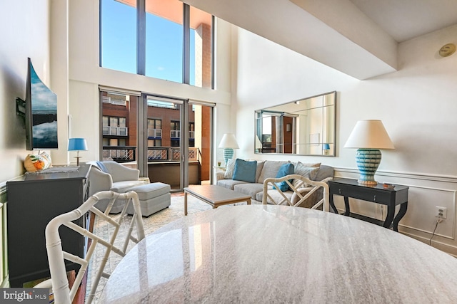 616 E NW Unit 1150, Washington, DC 20004 - living area with a high ceiling