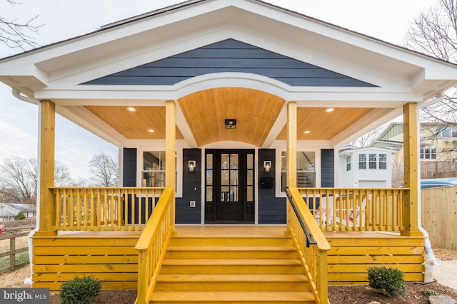 doorway to property featuring a porch