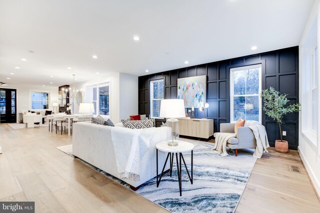 living room with light hardwood / wood-style flooring