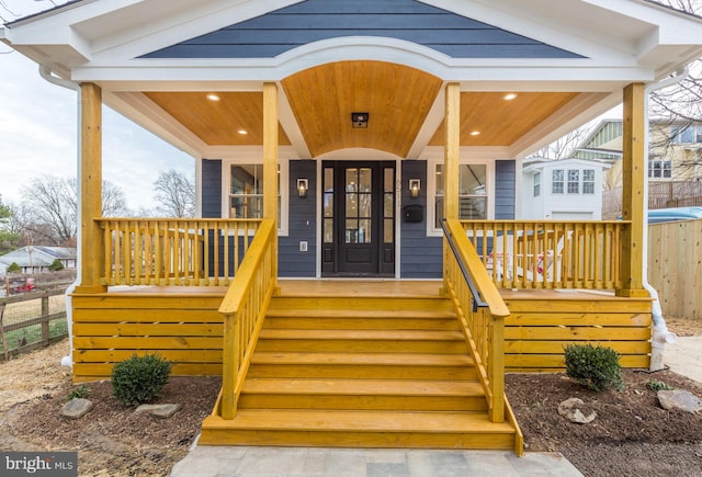 doorway to property featuring a porch