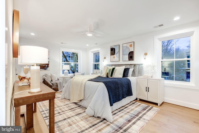 bedroom featuring ceiling fan and light wood-type flooring