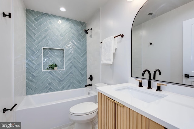 full bathroom with tiled shower / bath combo, vanity, and toilet