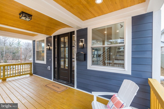 wooden terrace with covered porch